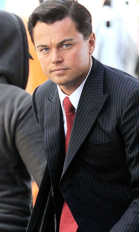 Leonardo DiCaprio on the set of The Wolf of Wall Street. idk but i'm really loving his dark hair ...