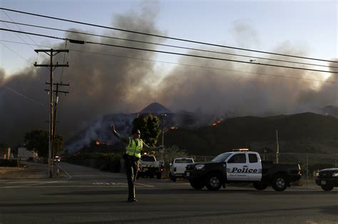 The Latest: Wildfire triggers evacuation order for Malibu