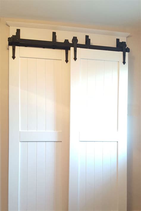 Soft close barn door hardware with bent strap | Barn door closet, Bypass barn door hardware, Diy ...