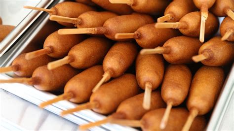 The Real Reason Corn Dogs Are Served On A Stick