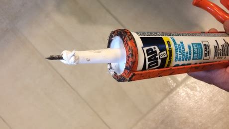 Reopening and Cleaning a Caulking Tube Nozzle - Fine Homebuilding