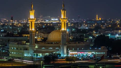 Dubai Skyline with Mosque Illuminated at Night Timelapse. Dubai, United Arab Emirates Stock ...