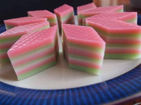 four pieces of soap sitting on top of a blue plate