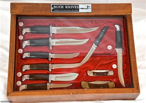 Early Buck knife display case with knives