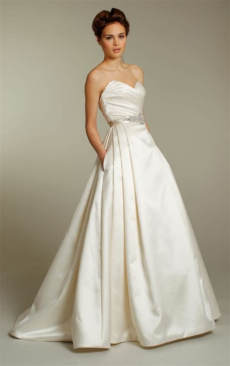 Classic ivory silk a-line wedding dress with embellished sash and sweetheart neckline