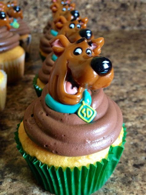 Simple Scooby Doo cupcakes in a quick hurry! 1- 1 box of cake mix 2- frosting, enough to cover ...