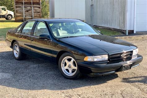 This 1996 Chevy Impala SS Was Stored In A Barn Brand New For 24 Years | Carscoops