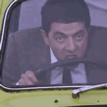 Mr. Bean Driving With His Teeth GIF | GIFDB.com