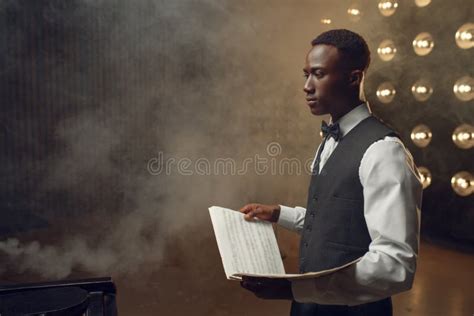 Black Pianist with Music Notebook on the Scene Stock Image - Image of ...