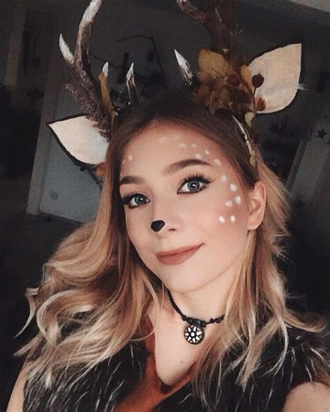 a woman with deer antlers on her head