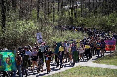 23 protesters charged with domestic terrorism after fiery clashes at Atlanta's 'Cop City ...