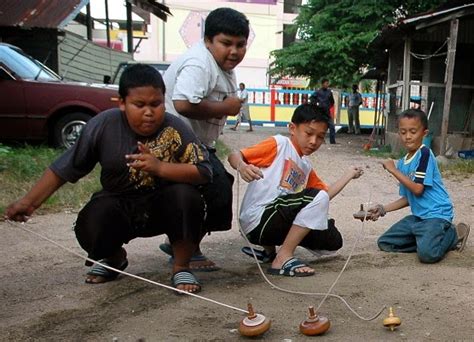 Budak-Budak Jitra: Permainan Gasing Tradisional