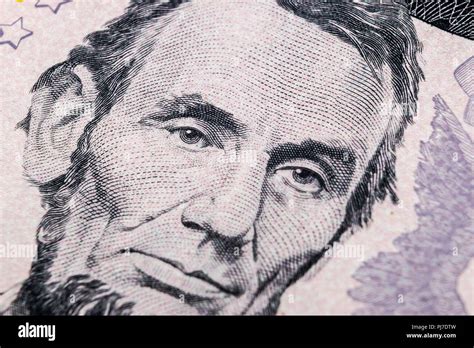 Close up view Portrait of Abraham Lincoln on the one five dollar bill ...