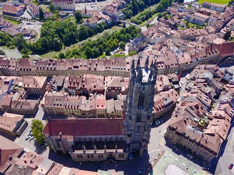 an aerial view of a city with many buildings