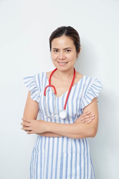 Premium Photo | Female doctor nurse with red stethoscope