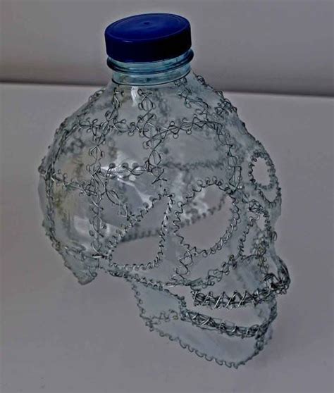 skull sculptures from recycled materials Plastic Bottle Art, Plastic ...