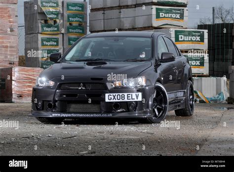 Modified Mitsubishi Evo X fast saloon car Stock Photo - Alamy