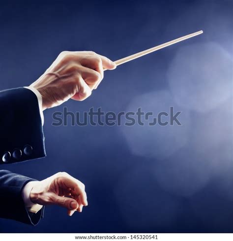 Orchestra Conductor Hands Baton Music Conducting Stock Photo (Edit Now) 145320541