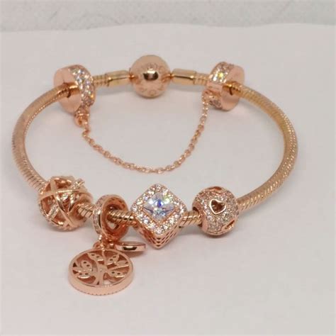 Pandora rose gold bracelet with 5 pandora rose gold charms set size 7.1 .7.5 . 7.9 inc ...