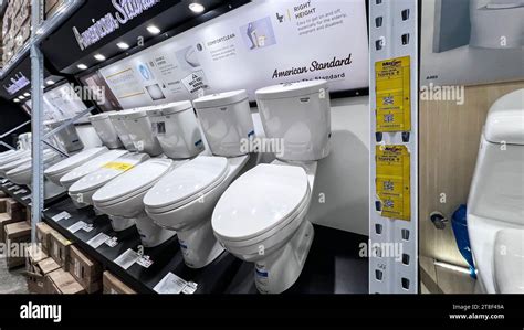 Ceramic toilet bowls of various shapes and sizes in the trading floor of a chain store. Bekasi ...