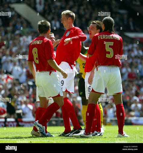 Peter Crouch celebrates with his 'Robot' dance after scoring England's 3rd goal against Jamaica ...