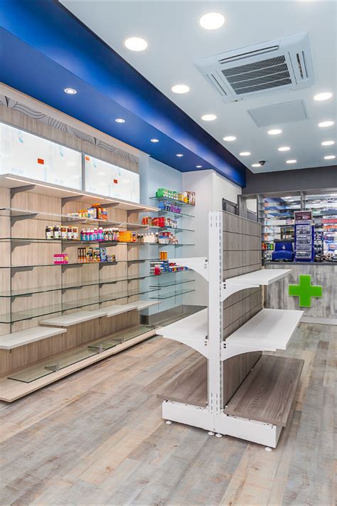 Shelving System | Pharmacy | Design and Install in 2020 | Pharmacy decor, Pharmacy design, Interior