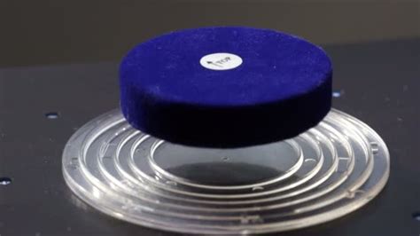 Magnet floating in a magnetic field Science Experiment — Stock Video © cobaltstock #27832733