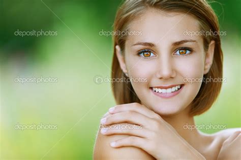 Smiling beautiful young woman close up — Stock Photo © BestPhotoStudio ...