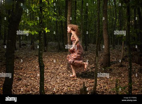 Woman running scared hi-res stock photography and images - Alamy