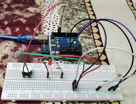 Use photoresistor with LED and Buzzer on Arduino Uno - Prgmine