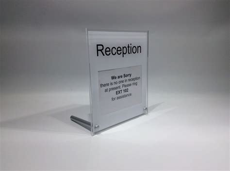 Reception desk sign Freestanding desk top sign with space to pop your own in "We are sorry there ...