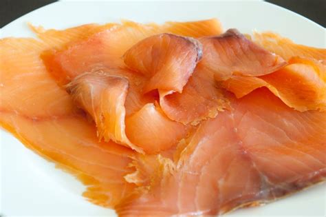 Dish of thinly sliced smoked salmon - Free Stock Image