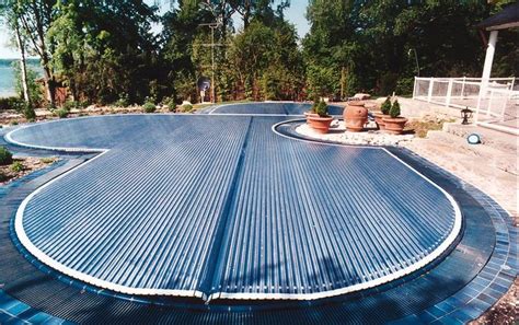 free form automatic rigid slated pool cover Covertech Grando | Pool ...