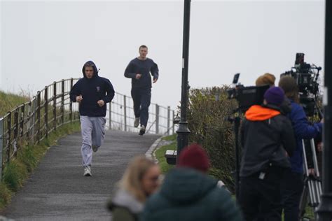 The Crown star Ed McVey seen jogging through St Andrews as filming continues on season 6