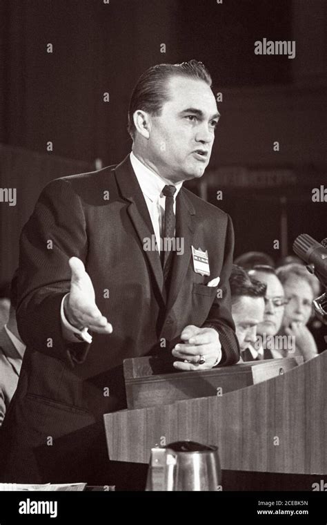 Alabama Governor George Wallace standing at the podium addressing an audience at the Democratic ...