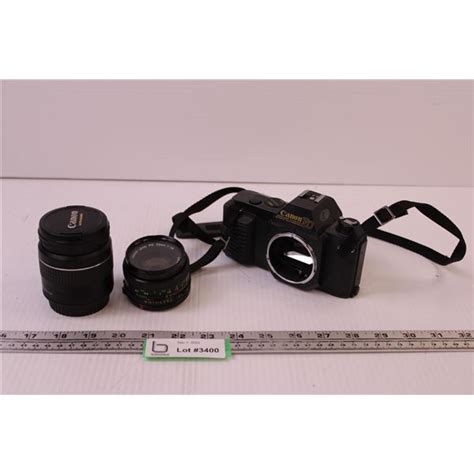 Canon T50 w/ 2 Lenses - Bodnarus Auctioneering