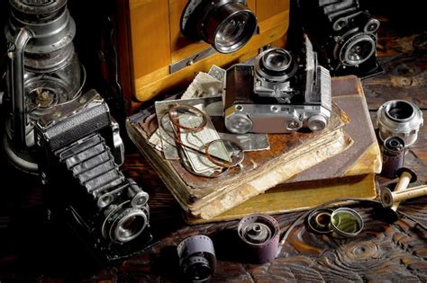 Premium Photo | A collection of old cameras and other items including a ...