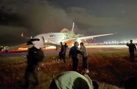 FEATURE: Passengers' mutual aid in deadly JAL crash made for "miracle" escape