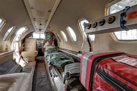 Interior of the Ambulance Jet with Cockpit in Background Stock Photo - Image of brown, stretcher ...