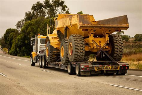 How To Safely Transport Construction Equipment?