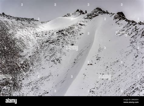 Landscape of snow mountains in Leh Ladakh with cloudy sky Stock Photo - Alamy