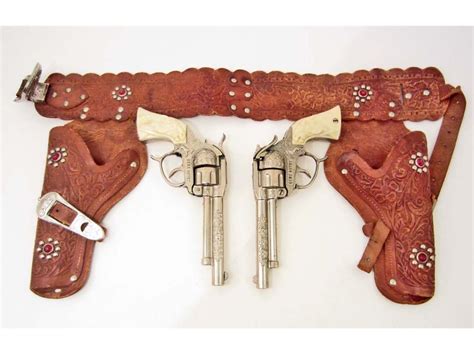 VINTAGE GENE AUTRY TOY CAP GUNS & HOLSTERS