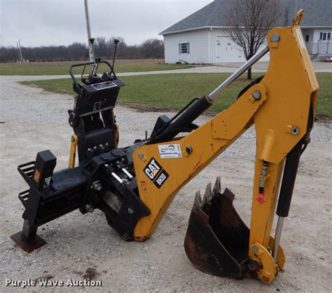 Caterpillar BH30 skid steer backhoe attachment in Rutledge, MO | Item DE6082 sold | Purple Wave