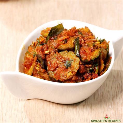 Bitter Gourd Curry | Karela Sabzi Recipe - Swasthi's Recipes