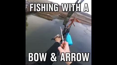 Catching a fish using a bow and arrow - YouTube