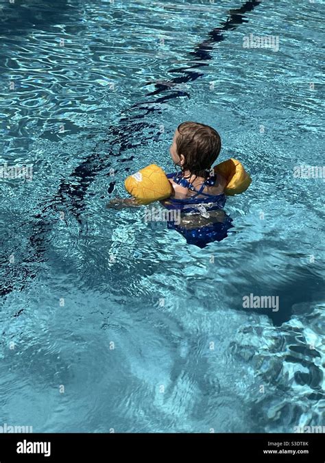 Child floaties hi-res stock photography and images - Alamy