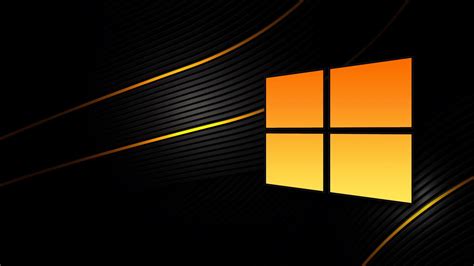 an orange and black wallpaper with the windows logo