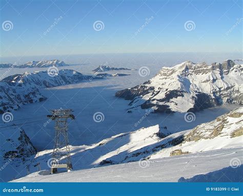 Snowy swiss mountains stock image. Image of winter, horizon - 9183399