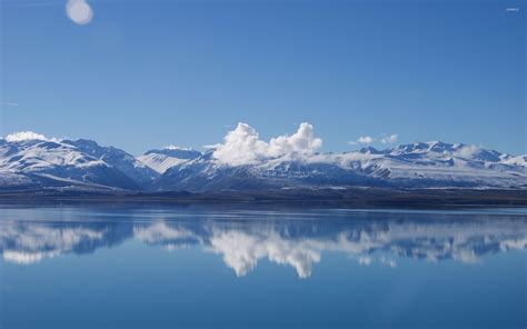 White clouds resting on the snowy mountain peaks wallpaper - Nature ...