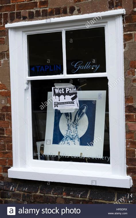 Wet Paint sign, Taplin Gallery, Woodbridge, Suffolk, UK Stock Photo - Alamy